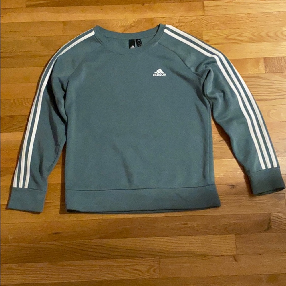 Green and white adidas crew
